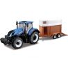 Model zemědělského traktoru Bburago 18-44069 - New Holland T7.315 s přívěsem v měřítku 1:35. Je vyroben z kovových a plastových dílů. Model má pryžové kolečka, odjímatelnou kabinu, detailní zpracování. Traktor v modré barvě s přívěsem v hnědé barvě je přibližně 30 cm velký.