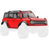 Traxxas karosérie Ford Bronco 2021 červená, pro RC model auta TRX-4M. Bez-sponková karoserie v měřítku 1:18 z ABS, kompletní, včetně čirých oken, makety rezervního kola, lemů blatníků, bočních zrcátek a dalších detailů.