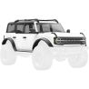 Traxxas karosérie Ford Bronco 2021 bílá, pro RC model auta TRX-4M. Bez-sponková karoserie v měřítku 1:18 z ABS, kompletní, včetně čirých oken, makety rezervního kola, lemů blatníků, bočních zrcátek a dalších detailů.