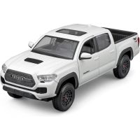 Kovový model auta 1:27 Maisto 32910W Toyota Tacoma TRD Pro nejen pro sběratele. Model je v detailním provedení a má otevíratelné dveře. Barva modelu je bílá a je přibližně 17 cm velký.