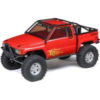 Expediční RC model auta Axial SCX10 III Toyota SR5 1987. Licencovaná bezsponková karoserie s rámovou konstrukcí, čirými okny a LED osvětlením. Kovové šasi s víceprvkovým zavěšením, funkce DIG (zablokování zadní nápravy), portálové nápravy. Elektronika Spektrum, vysílač SLT3.